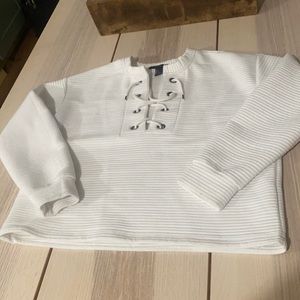 white lace up sweater.
